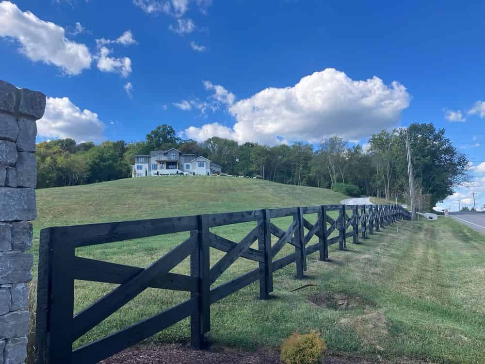 Farm Fence Staining image